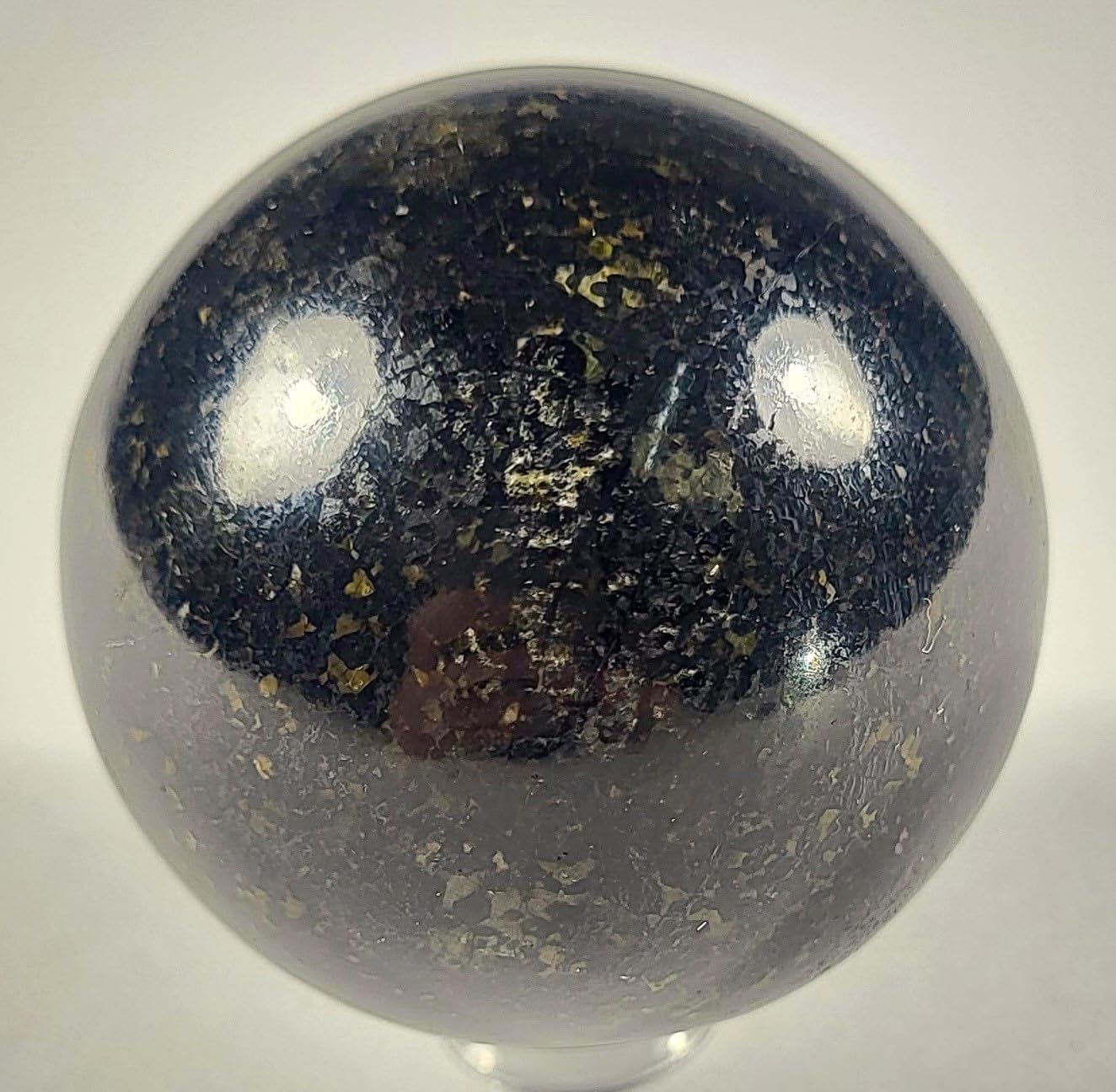 49mm Black Nuumite Carved Sphere with Stand
